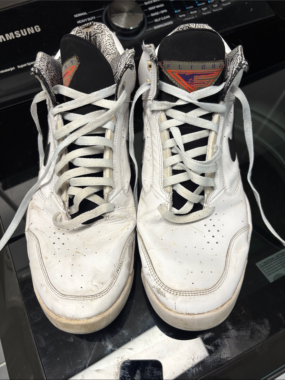 Nike Men’s White and Black High-Top Sneakers